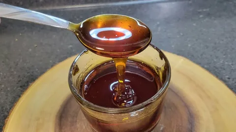 قند مایع خرما اصل با طعم طبیعی و شیرین